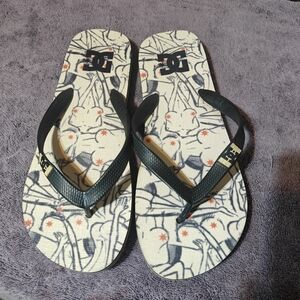 DC Graphic Flip Flops with Black and White Design